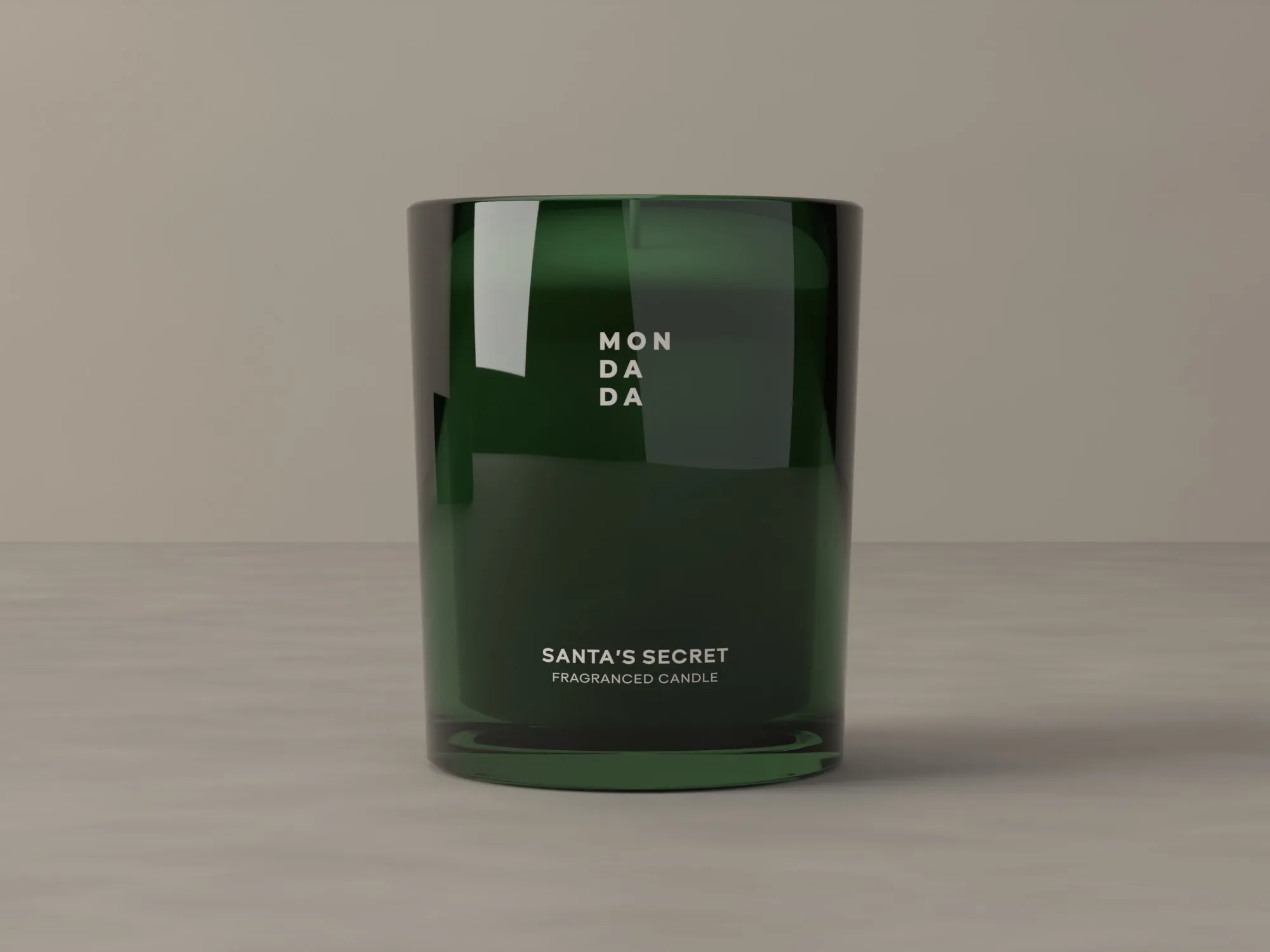 The Santa's Secret fragranced candle in green glass