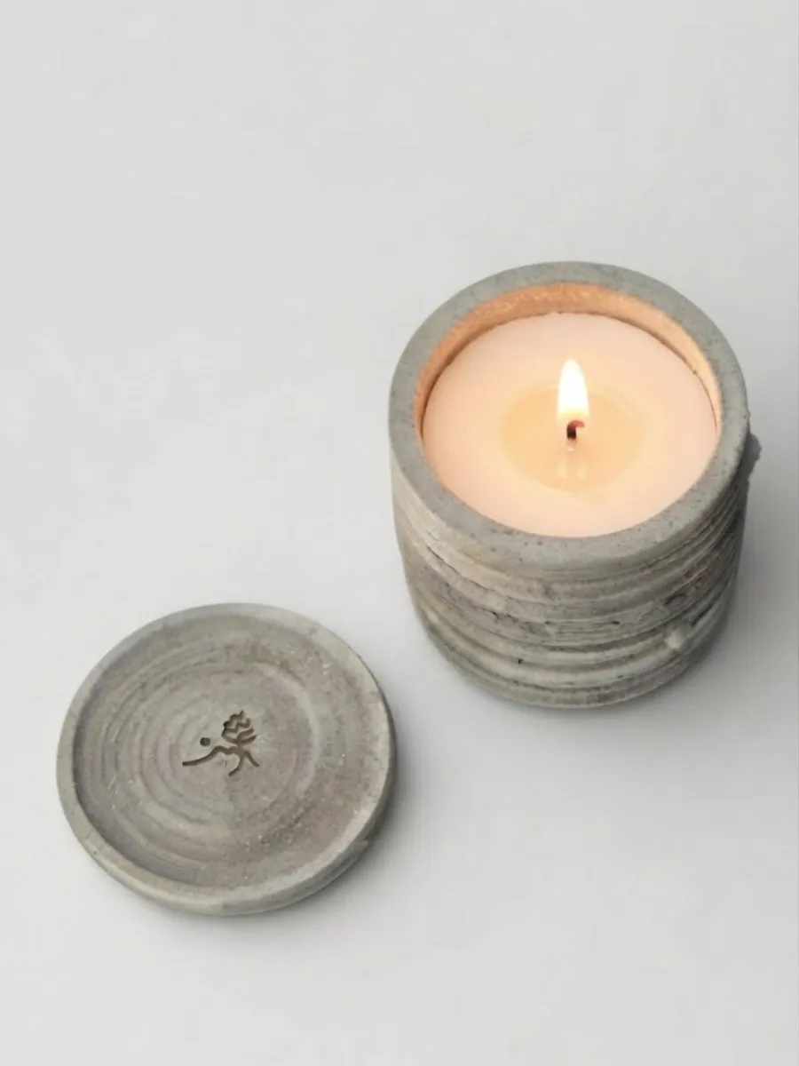 Ridged hand-cast concrete candle and lid