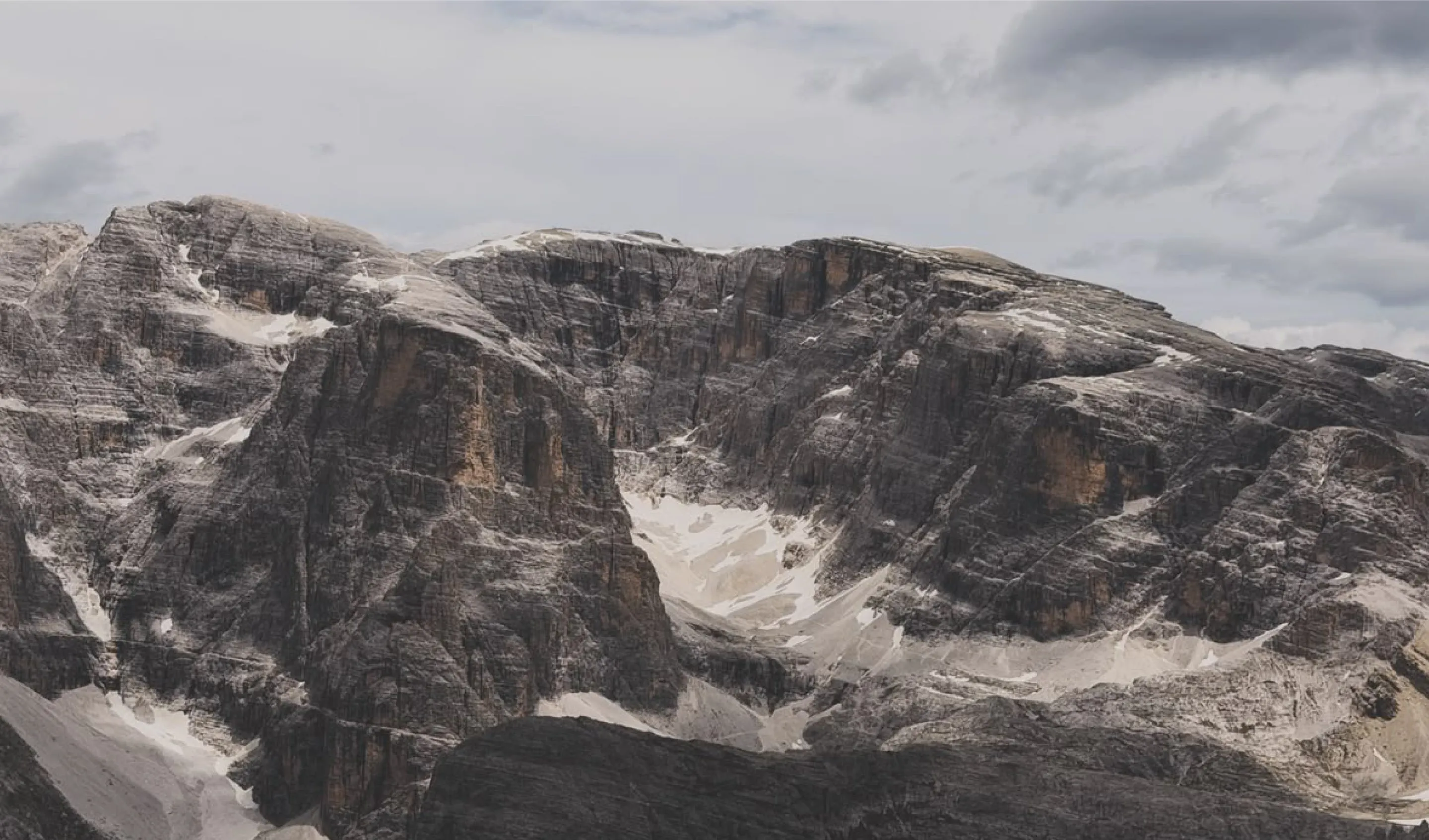 Dolomite peaks under a grey sky